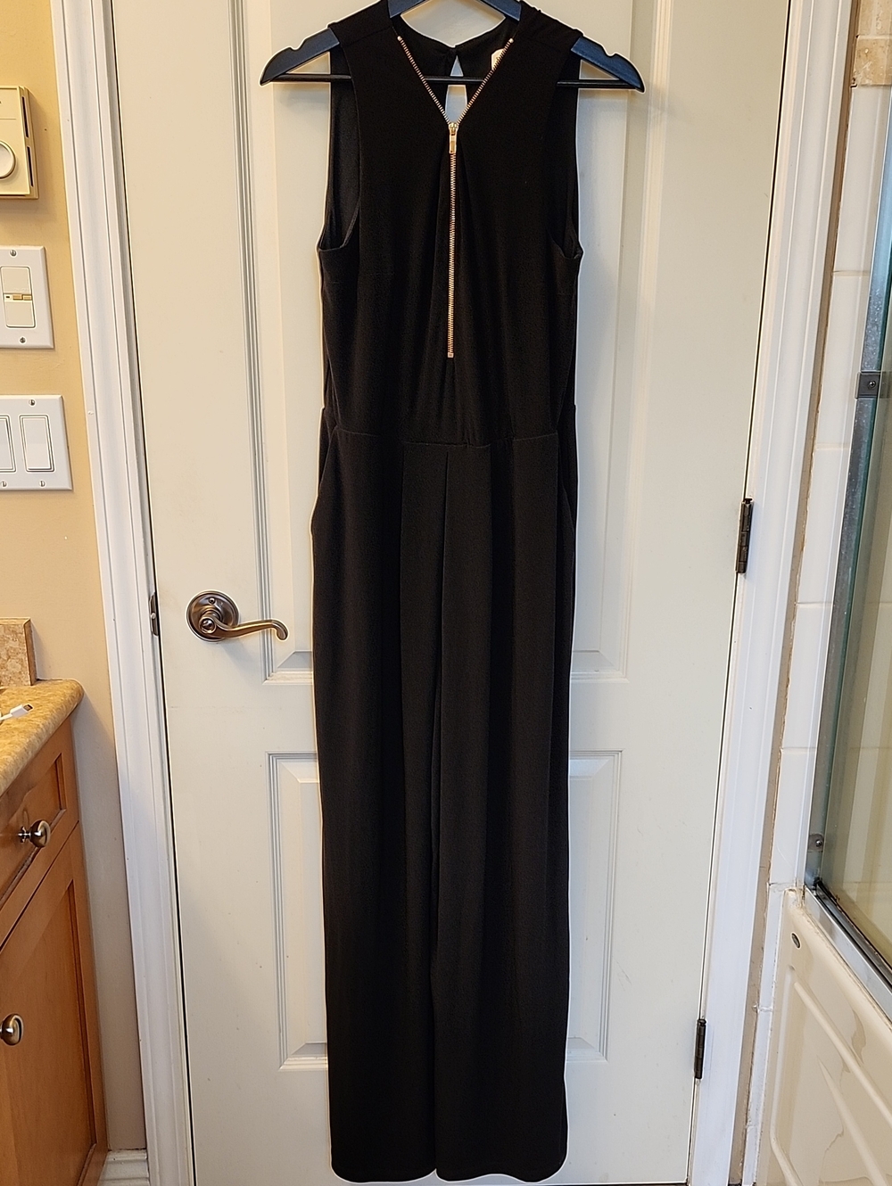 ✨️NWT✨️ Black Sleeveless V-Neck, Flared Pant Jumpsuit with Front Zip, Size 8